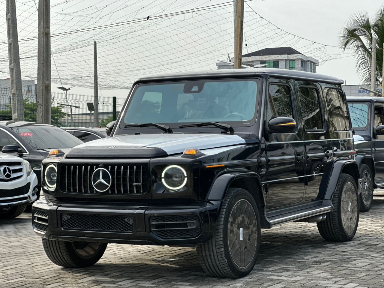 Black Mercedes-Benz G-Wagon at the showroom